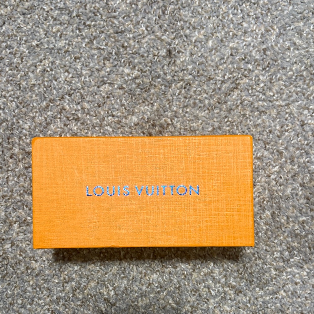 Louis Vuitton sun glasses with gold Logo